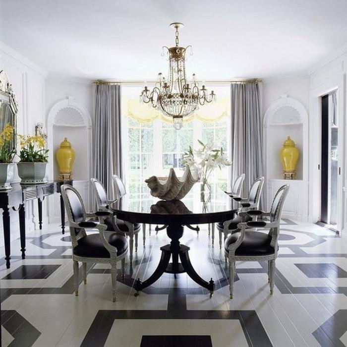 Black and white dining room with crystal chandelier