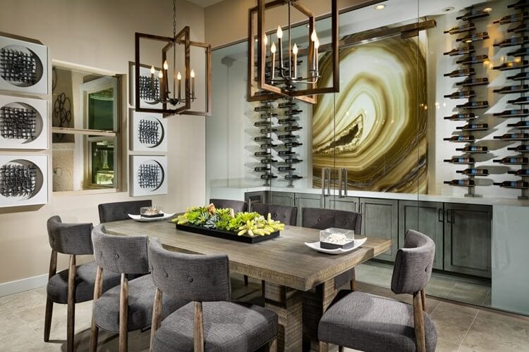 Dining room with agate wall art with vertical wine storage.