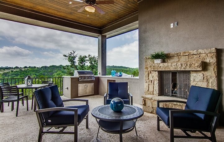 Outdoor patio with stone fireplace