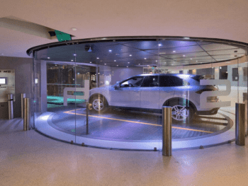 Glass car elevator in the Porsche Design Tower