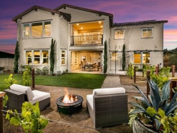 Backyard of Contemporary Home with firepit.