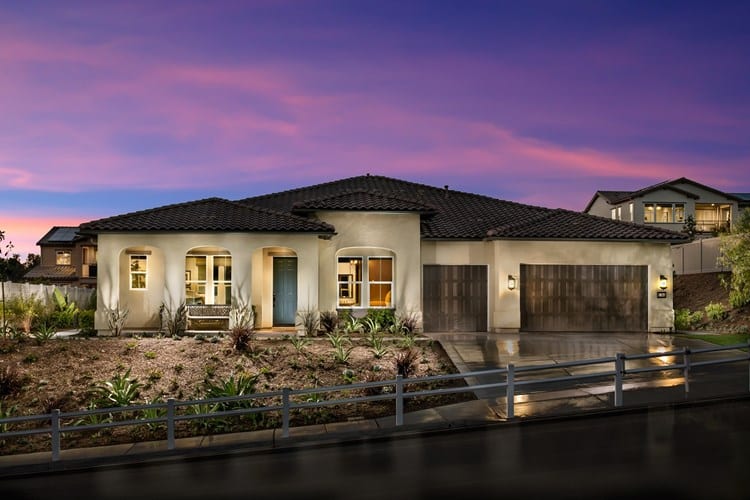 Rendering of ranch-style home at dusk.