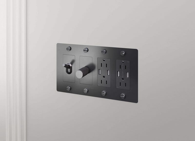 Electrical outlet with knob and switch.