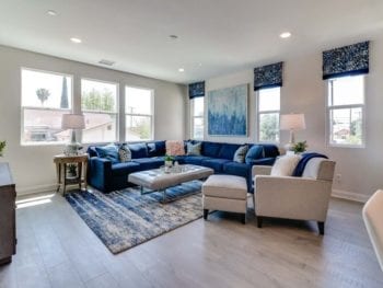 Blue sectional couch in living room.