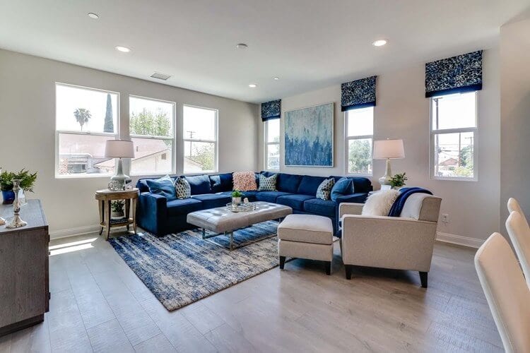 Blue sectional couch in living room.