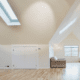 Attic space featuring skylights.