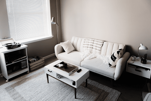 White couch in living room area.