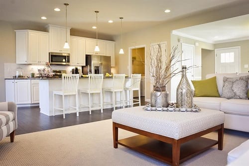 Kitchen with white cabinets and island.